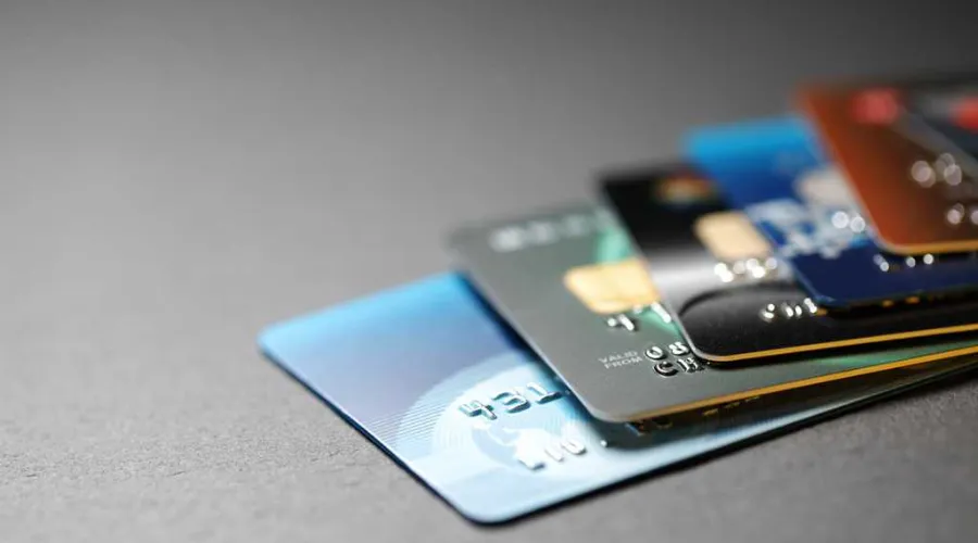 How can I order a custom metal debit card, and what customization options are typically available
