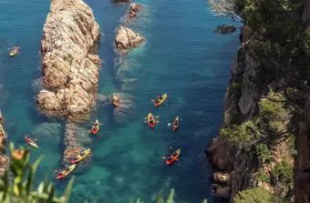 Costa Brava Day Adventure: Kayak, Snorkel & Cliff Jump with Lunch